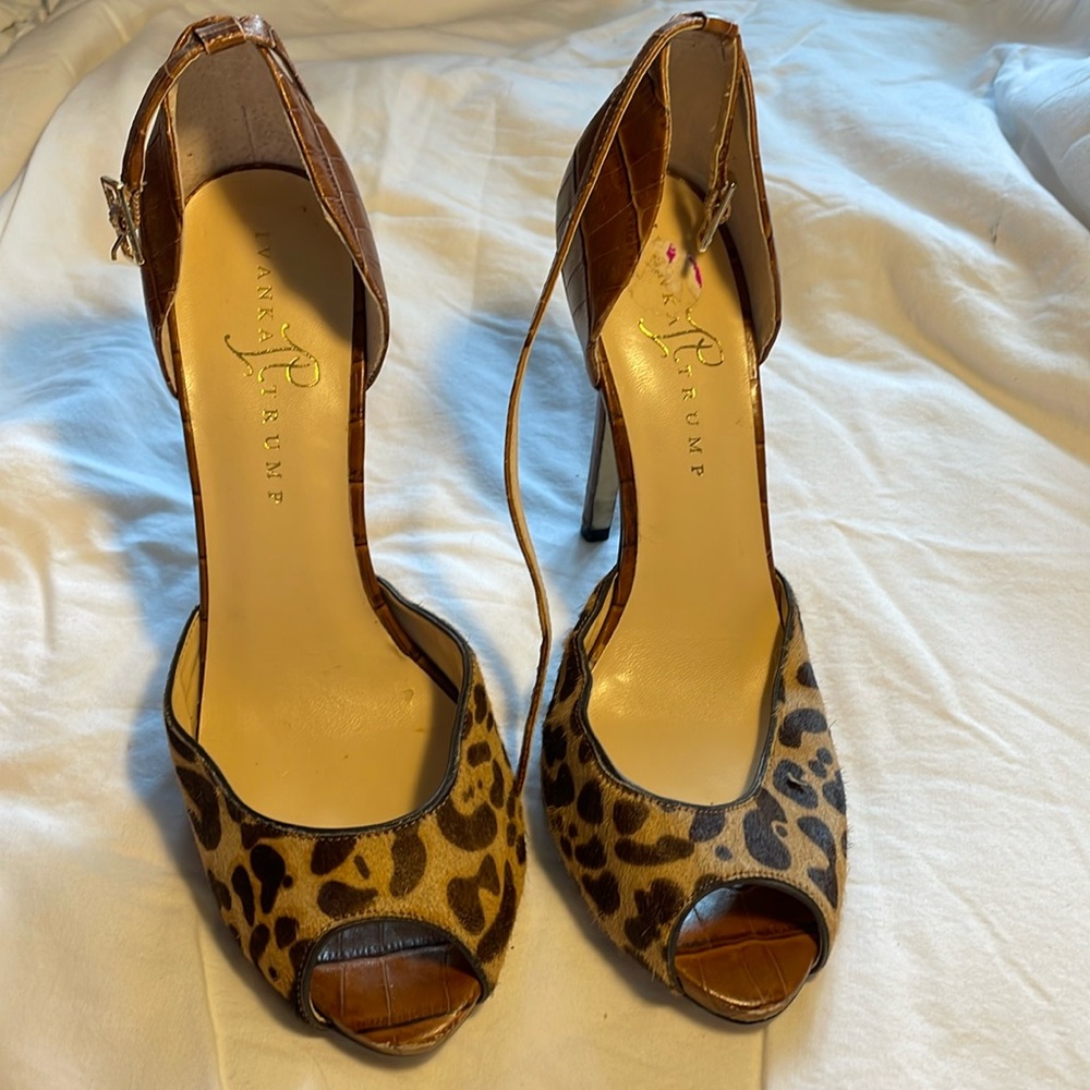 Ivanka Trump leopard print peep toe stiletto heels.